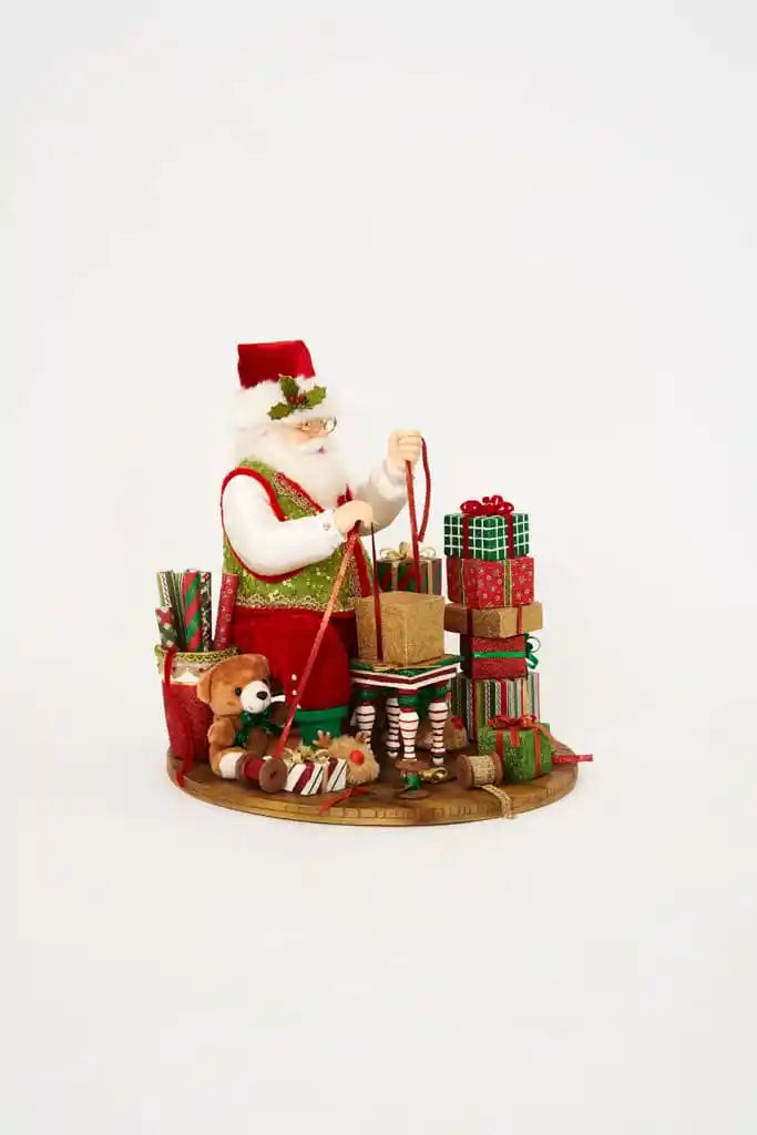 Santa Wrapping Presents Scene