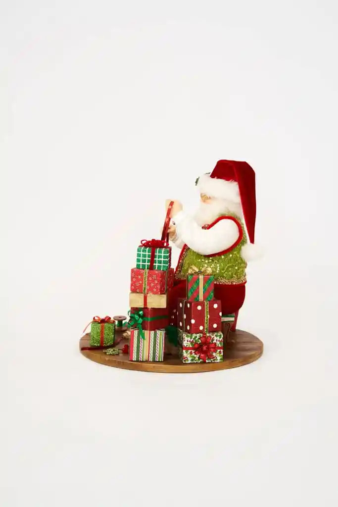 Santa Wrapping Presents Scene