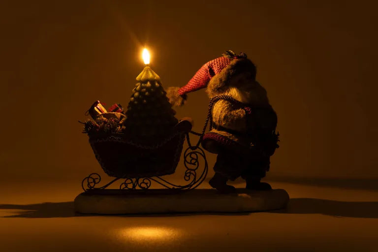 North Country Santa Pulling Sleigh Candle Holder